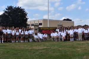 image of Bethlehem Catholic Students infront of the school media sign that says Welcome Back Students, Faculty, and Staff