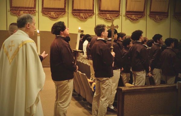 image of Father Ezaki and students processing into Mass
