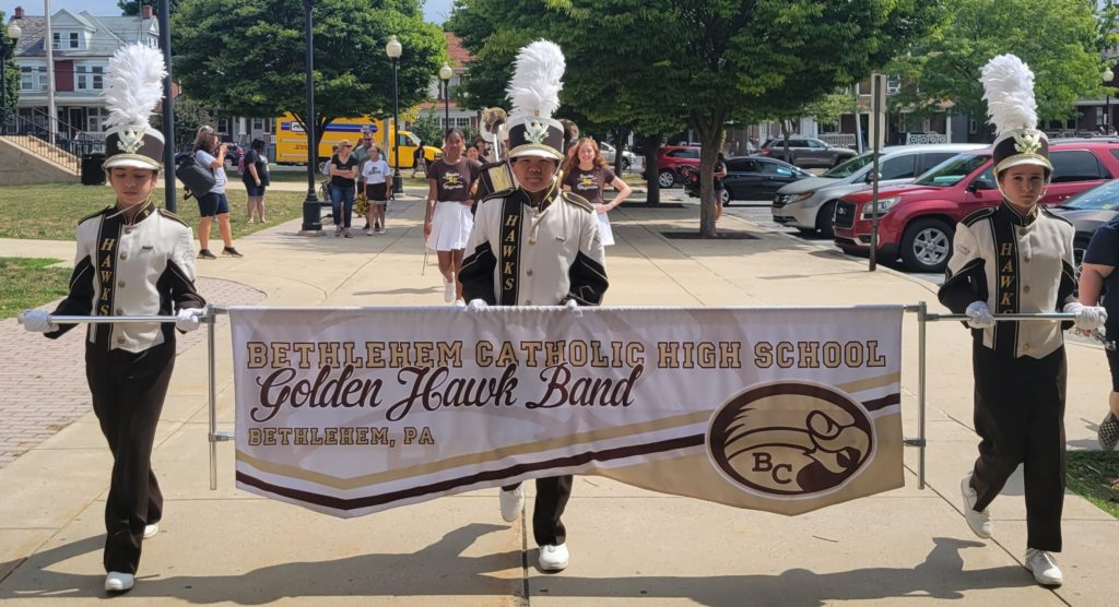 Bethlehem Catholic Marching Band Students hold banner