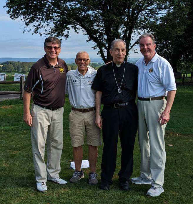 Tom Vresics, Mike Grasso, Father Ezaki and Dean Donaher